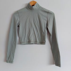 TNA mock-neck crop top